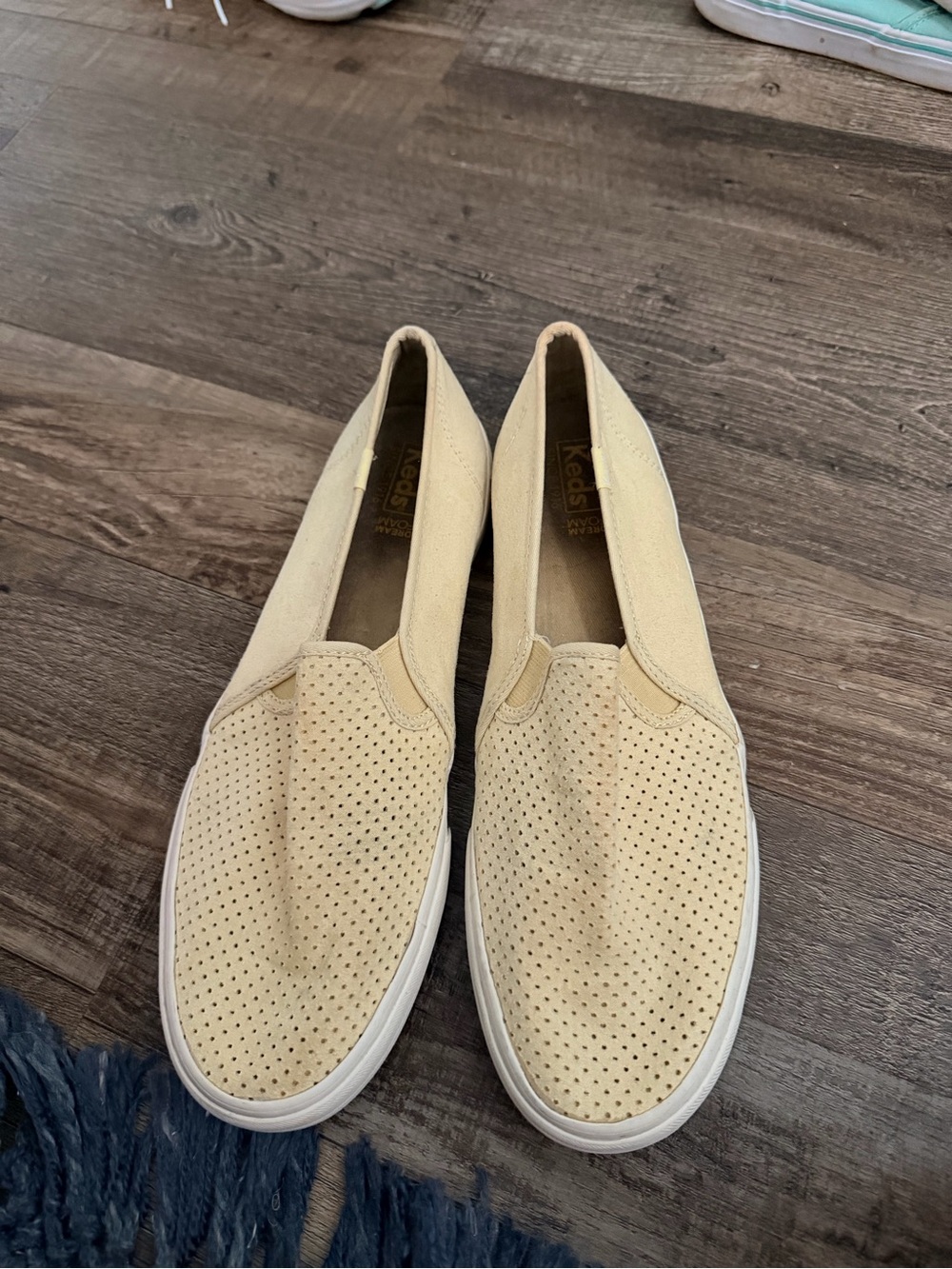 Keds Slip-On Perforated Canvas Sneakers in Cream
